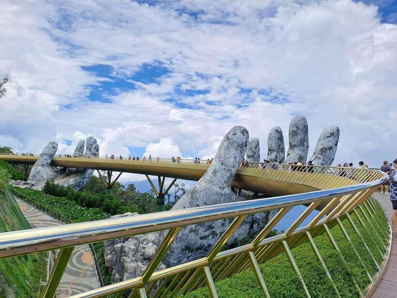 Bana Hills & Golden Hand Bridge Tour from Hoi An/ Da Nang - Walking across the Golden Hand Bridge