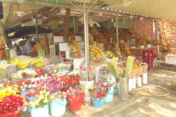 Da Nang Night Motorbike Tour & River Cruise Riding By Lady Rider - The night market and Sun Wheel views