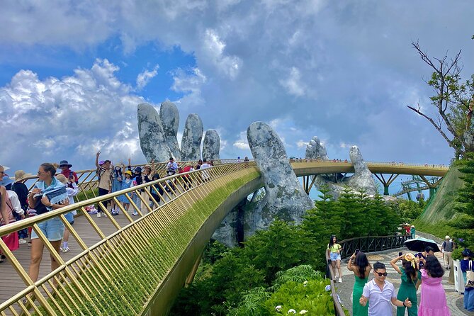 Full-Day Private Tour in Golden Bridge and Ba Na Hills - Riding the cable car above the forest
