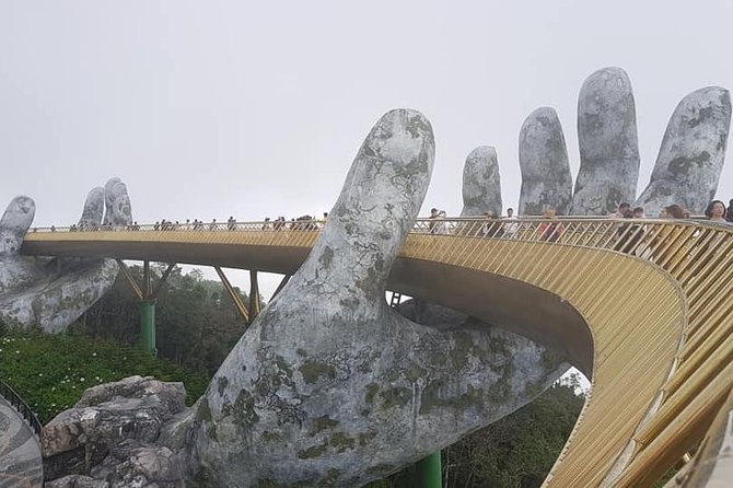 Golden Bridge & Hoi An City Tour with RiverBoat Ride-Night Market - The Golden Bridge and its giant stone hands