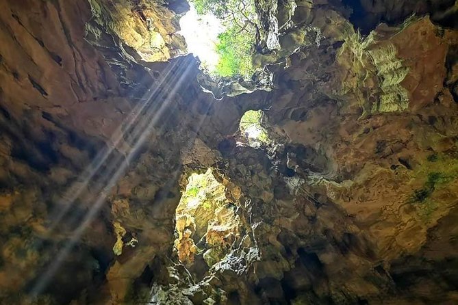 Guided Tour to Marble Mountains & Hoi An Walking Tour , Night Market, Boat Ride - Climbing through Marble Mountains
