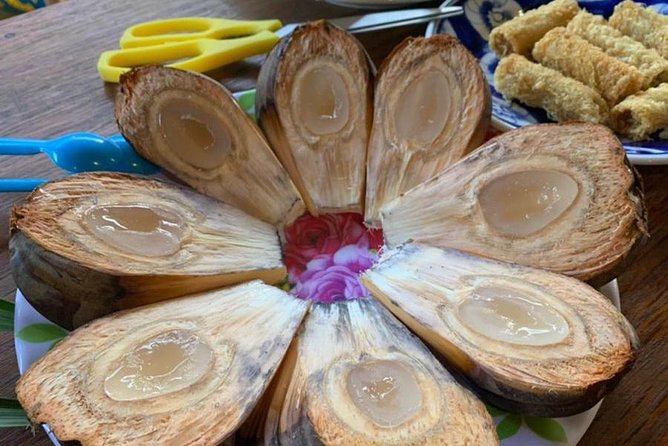 Hoi An City and Basket Boat Tour from Da Nang City - Riding a basket boat in Cam Thanh