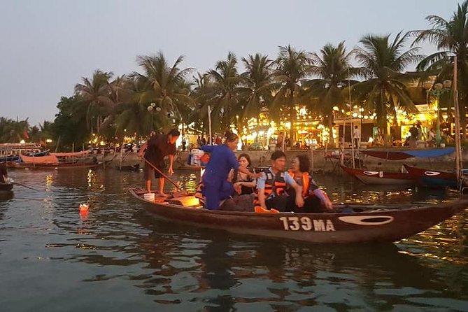 Hoi An Nightlife Tour with Hoi An Ancient Walking Tour, Boat Ride, Night Market - Lanterns, market food, and the evening atmosphere