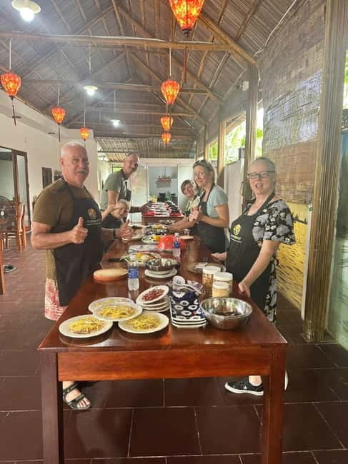 Market Tour, Basket Boat Ride & Cooking Class by Hangcoconut - Riding a round boat through Bay Mau coconut forest
