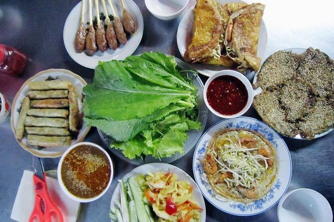 Private HoiAn Ancient Town Night Market Street food tour by Night - Hoi An after dark, with food built into the walk