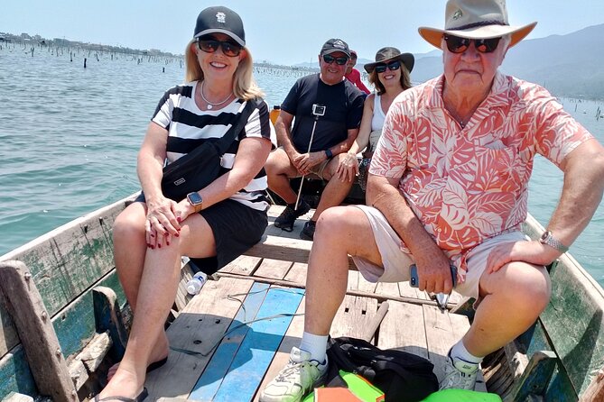 Vietnam/Lang Co Oyster Tour by Fishing & Tasting Oyster Flavors - Rolling the net by foot on Lap An Lagoon